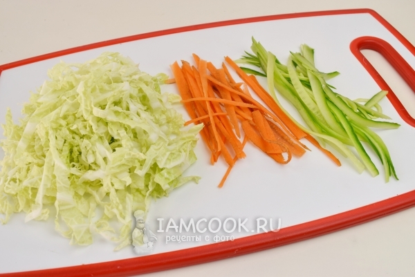 Cut carrot, cabbage and cucumber