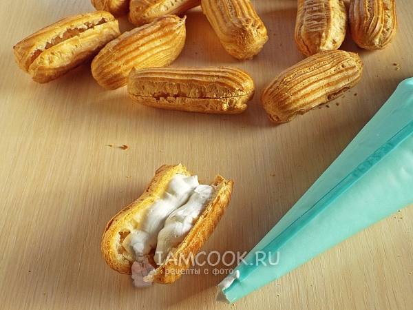 Fill eclairs with cream