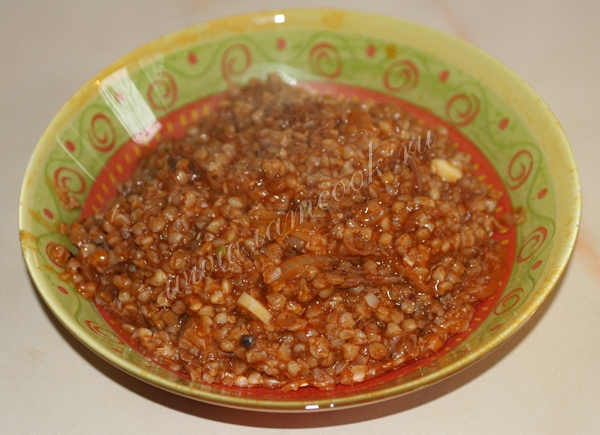 Juicy buckwheat with stew on homemade