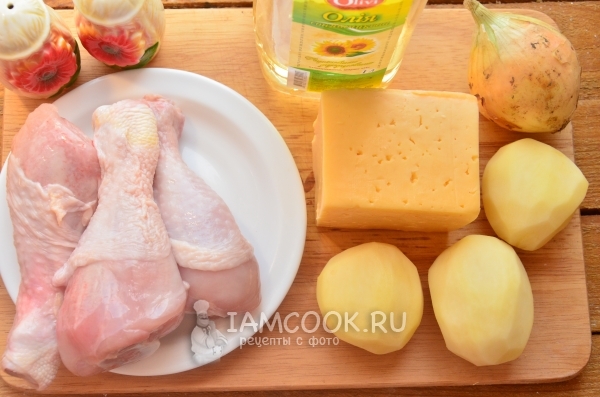 Ingredients for potatoes with chicken legs and cheese in the oven