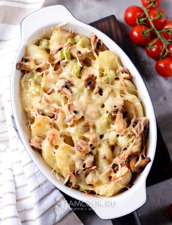 A potato recipe with mushrooms and cheese in the oven