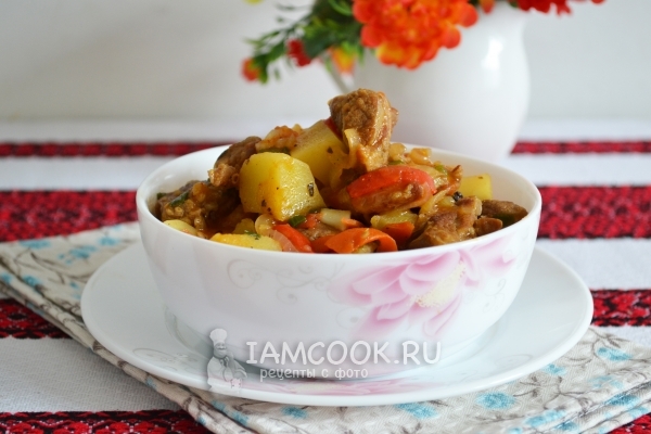 Potatoes with meat in cauldron