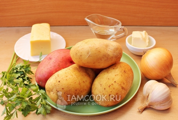 Ingredients for potatoes with cheese in foil in the oven