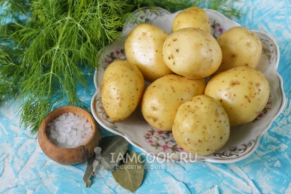 Ingredients for potatoes in a uniform in a microwave oven