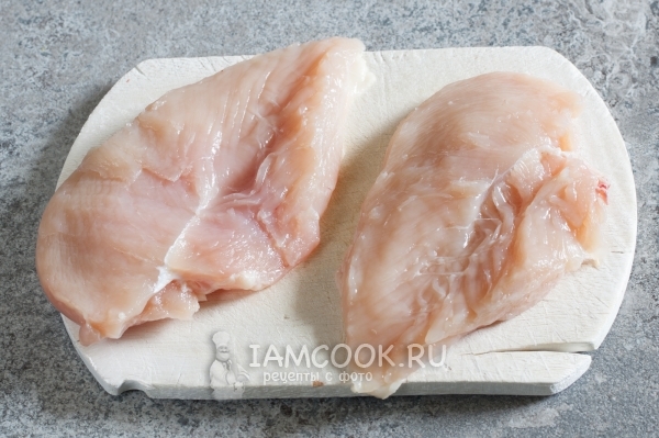 Cut the chicken breast in half
