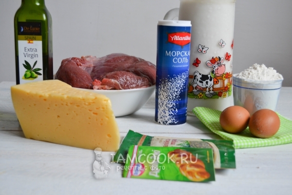 Ingredients for pie with dough meat and cheese