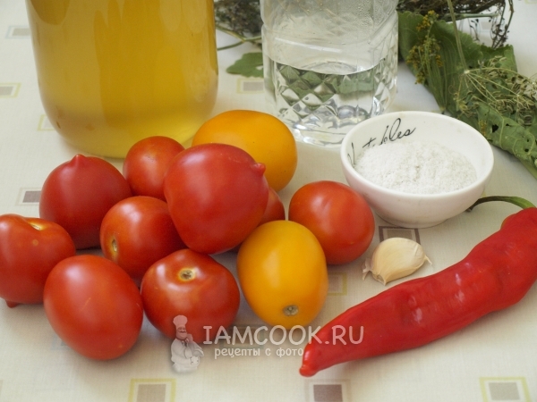 Ingredienti per pomodori con miele per l'inverno