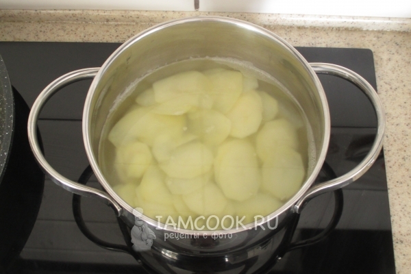 Put the potatoes in the water