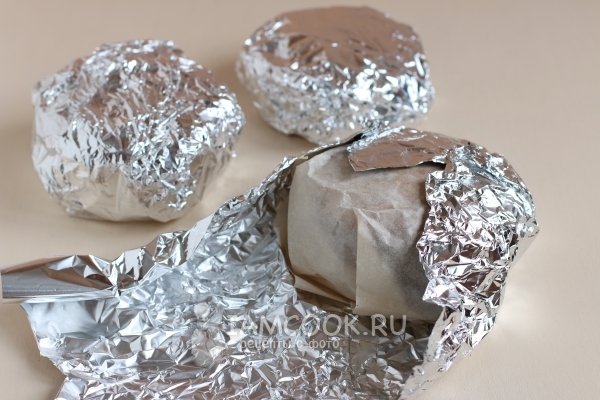 Roll the muffins into parchment and foil