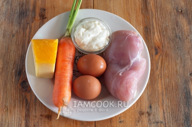 Ingredients for salad with chicken, carrots, cheese and eggs