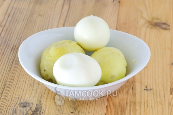 Boil and peel eggs and potatoes