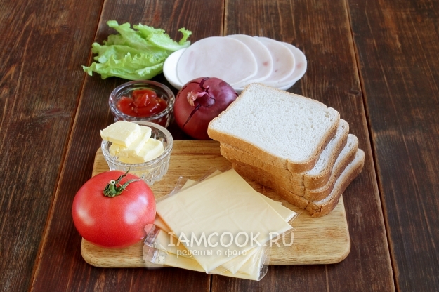 Ingredienser til en sandwich med skinke og ost