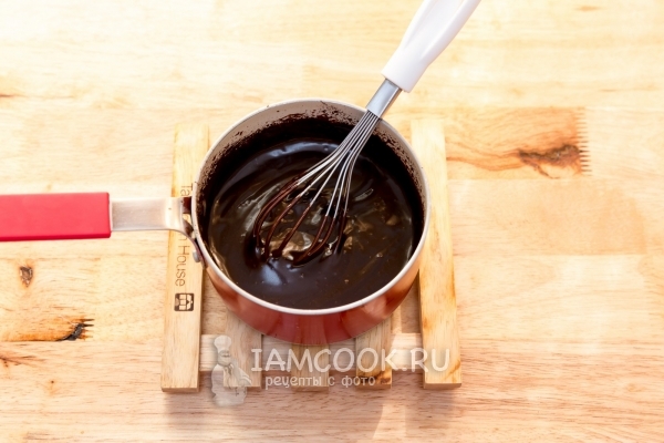 Photo of chocolate sauce on boiled condensed milk