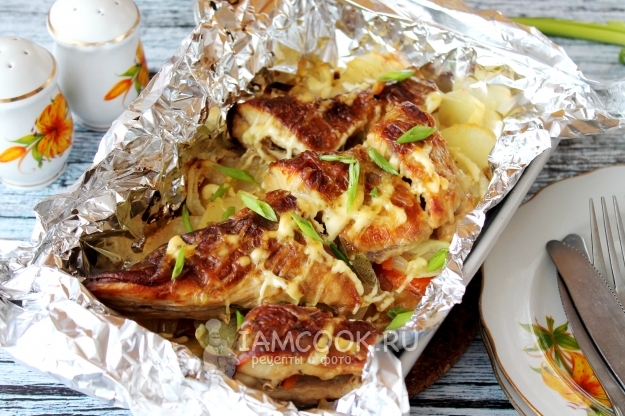 Photo of pikes with potatoes and mayonnaise in the oven