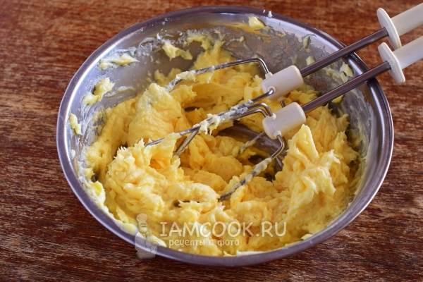 Beat butter with condensed milk