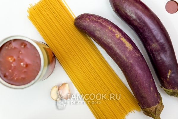 Ingredients for pasta (spaghetti) with eggplants and tomatoes