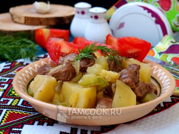 Photo of stewed potatoes with zucchini and meat
