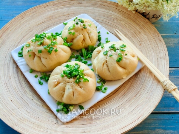 Photo of vegetarian pies of baozi with cabbage and mushrooms
