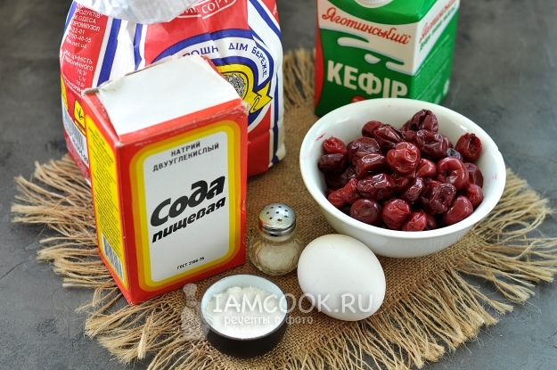 Ingredients for fried pies with cherries in a frying pan